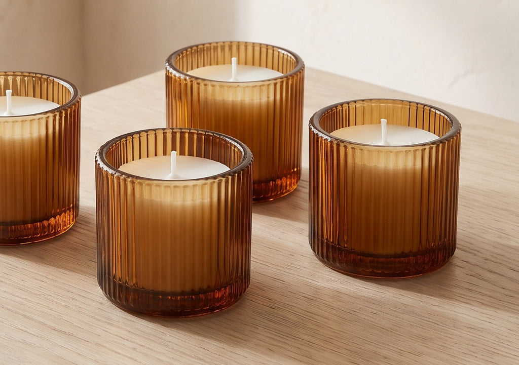 Close-up of the ribbed amber glass tealight holders with white tealights